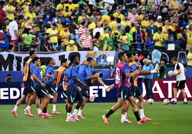 Brazil's players warm up ahead of the 2026 World Cup Group C football match between Brazil and Haiti at the Philadelphia Stadium in Philadelphia on June 19, 2026.  (Photo by Jewel SAMAD / AFP)