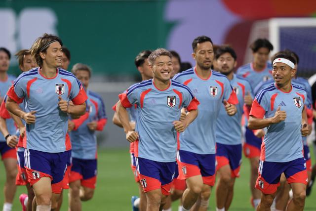 Japan's midfielder #10 Ritsu Doan (C) and teammates take part in an MD-1 training session at the Rayados Training Centre in Santiago, near Monterrey, Mexico on June 19, 2026, on the eve of the 2026 World Cup Group F football match between Tunisia and Japan.  (Photo by Julio Cesar AGUILAR / AFP)