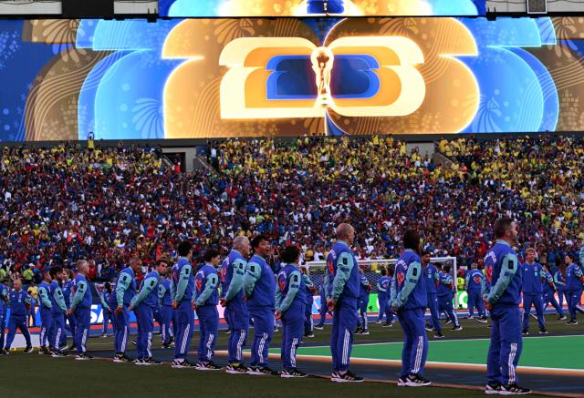 FIFA volunteers stand on the pitch ahead of the 2026 World Cup Group C football match between Brazil and Haiti at the Philadelphia Stadium in Philadelphia on June 19, 2026.  (Photo by ROBERTO SCHMIDT / AFP)