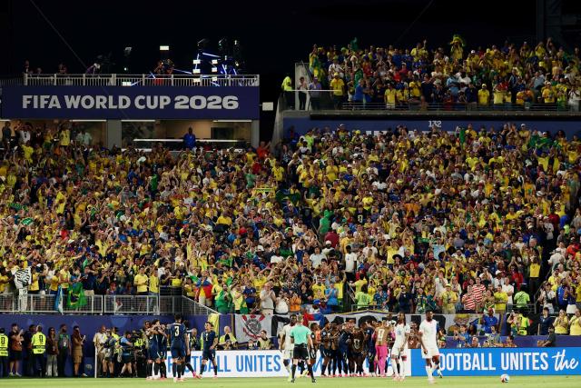 Brazil’s players celebrate after forward #07 Vinicius Junior scores his team’s third goal during the 2026 World Cup Group C football match between Brazil and Haiti at the Philadelphia Stadium in Philadelphia on June 19, 2026.  (Photo by Charly TRIBALLEAU / AFP)