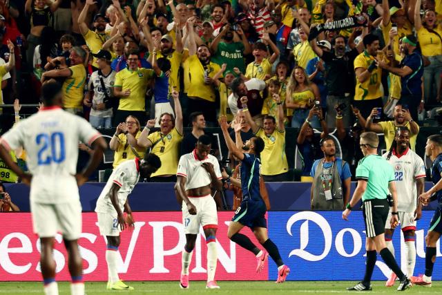 Brazil's forward #09 Matheus Cunha (C) celebrates scoring his team's first goal during the 2026 World Cup Group C football match between Brazil and Haiti at the Philadelphia Stadium in Philadelphia on June 19, 2026.  (Photo by Charly TRIBALLEAU / AFP)