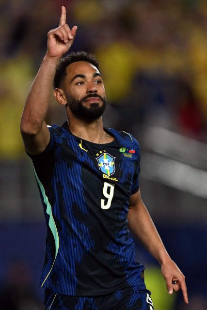 Brazil's forward #09 Matheus Cunha celebrates scoring his team's first goal during the 2026 World Cup Group C football match between Brazil and Haiti at the Philadelphia Stadium in Philadelphia on June 19, 2026.  (Photo by Mauro PIMENTEL / AFP)