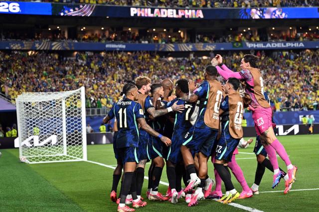 Brazil’s players celebrate after forward #09 Matheus Cunha scores his team’s second goal during the 2026 World Cup Group C football match between Brazil and Haiti at the Philadelphia Stadium in Philadelphia on June 19, 2026.  (Photo by Mauro PIMENTEL / AFP)