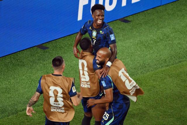 Brazil’s players celebrate after forward #07 Vinicius Junior (C) scores his team’s third goal during the 2026 World Cup Group C football match between Brazil and Haiti at the Philadelphia Stadium in Philadelphia on June 19, 2026.  (Photo by Angela WEISS / AFP)