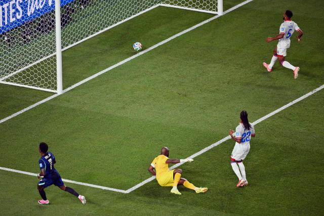 Brazil's forward #07 Vinicius Junior (L) scores his team's third goal during the 2026 World Cup Group C football match between Brazil and Haiti at the Philadelphia Stadium in Philadelphia on June 19, 2026.  (Photo by Angela WEISS / AFP)