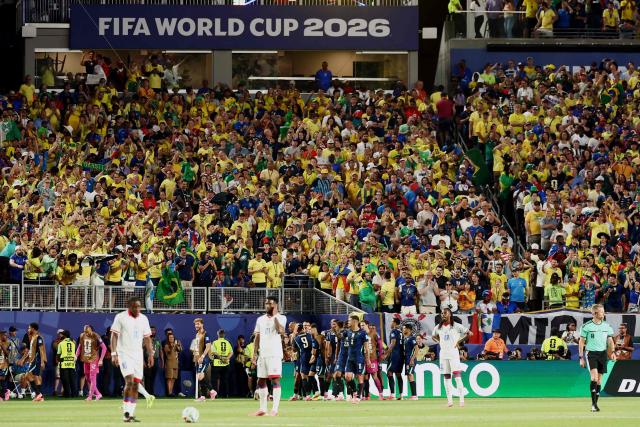 Brazil’s players celebrate after forward #07 Vinicius Junior scores his team’s third goal during the 2026 World Cup Group C football match between Brazil and Haiti at the Philadelphia Stadium in Philadelphia on June 19, 2026.  (Photo by Charly TRIBALLEAU / AFP)