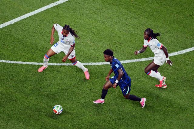 Haiti's defender #22 Jean-Kevin Duverne and Brazil's forward #07 Vinicius Junior fight for the ball during the 2026 World Cup Group C football match between Brazil and Haiti at the Philadelphia Stadium in Philadelphia on June 19, 2026.  (Photo by Angela WEISS / AFP)