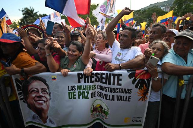 Supporters of Colombia's President Gustavo Petro attend a rally in Cali, Colombia, on June 19, 2026, two days ahead of the presidential runoff. Colombians vote on June 21, 2026 in a presidential runoff pitting a hard-right opera-singer-turned-lawyer against a leftist senator, an election with stark consequences for the country's stumbling peace process with armed groups and strained ties with Washington. (Photo by Joaquin SARMIENTO / AFP)