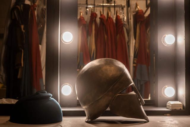 This photograph shows costumes displayed backstage for the opera 'Medea' at the Ancient Greek theatre of former city Epidaurus, in Nea Epidavros on June 18, 2026. With flamboyant costumes reminiscent of those from 1961, and a production reconstructed using notebooks and photographs from the period: 'Medea', the opera that brought Maria Callas her triumph, is being revived at the ancient Greek theatre of Epidaurus. During a one-off, sold-out performance on Saturday evening, the Greek National Opera returns for the first time in 65 years to this 4th-century BC amphitheatre, 200 kilometres from Athens, renowned for its exceptional acoustics. (Photo by Aris MESSINIS / AFP)