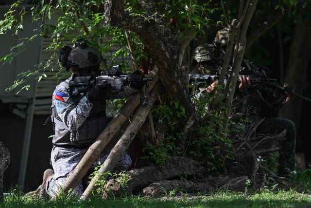 Philippine and South Korean troops participate in an amphibious raid military exercise at the marines training base in Ternate, Cavite province, west of Manila on June 20, 2026, as part of the annual Philippines-US joint marines exercise dubbed Kamandag (Venom). (Photo by Jam STA ROSA / AFP)