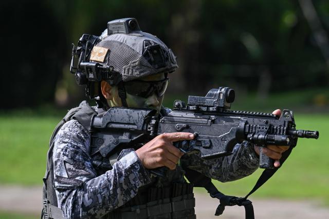 A member of the Philippine troops participate in an amphibious raid military exercise at the marines training base in Ternate, Cavite province, west of Manila on June 20, 2026, as part of the annual Philippines-US joint marines exercise dubbed Kamandag (Venom). (Photo by Jam STA ROSA / AFP)