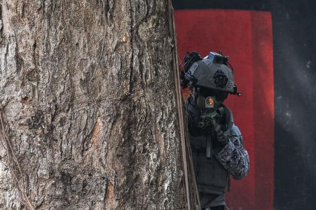 A member of the Philippine troops participate in an amphibious raid military exercise at the marines training base in Ternate, Cavite province, west of Manila on June 20, 2026, as part of the annual Philippines-US joint marines exercise dubbed Kamandag (Venom). (Photo by Jam STA ROSA / AFP)