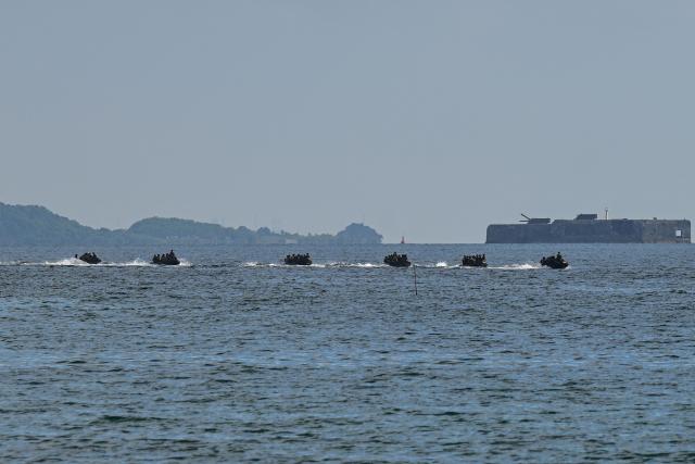 Philippine and South Korean troops participate in an amphibious raid military exercise at the marines training base in Ternate, Cavite province, west of Manila on June 20, 2026, as part of the annual Philippines-US joint marines exercise dubbed Kamandag (Venom). (Photo by Jam STA ROSA / AFP)
