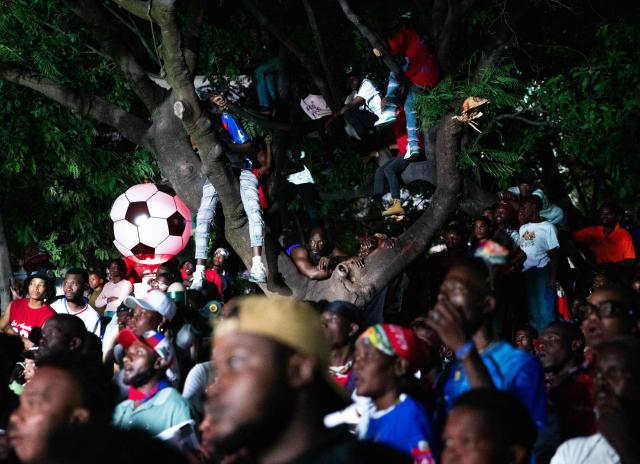 Haiti fans watch the 2026 World Cup match between Brazil and Haiti in Port-au-Prince, Haiti, on June 19, 2026. (Photo by Clarens SIFFROY / AFP)