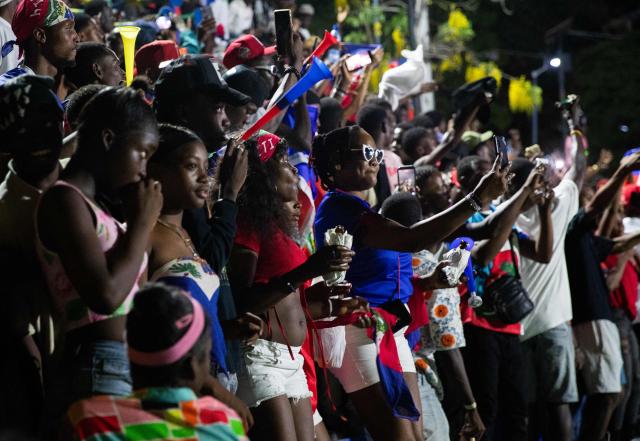 Haiti fans react while watching the 2026 World Cup match between Brazil and Haiti in Port-au-Prince, Haiti, on June 19, 2026. (Photo by Clarens SIFFROY / AFP)