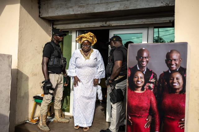 A guest walks out the venue during the traditional wedding ceremony of twin brothers Taiwo and Kehinde Oguntoye and twin sisters Taiwo and Kehinde Adediran at the RAD Events Hall in Ibadan, on June 19, 2026. (Photo by OLYMPIA DE MAISMONT / AFP)