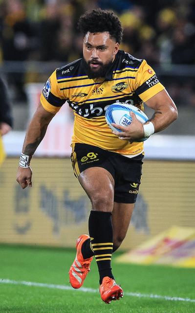 Hurricanes Fehi Fineanganofo runs the ball during the Super Rugby Pacific final match between the Wellington Hurricanes and Waikato Chiefs in Wellington on June 20, 2026. (Photo by Grant Down / AFP)