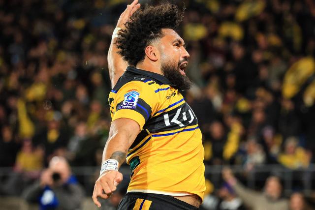 Hurricanes Fehi Fineanganofo celebrates his try during the Super Rugby Pacific final match between the Wellington Hurricanes and Waikato Chiefs in Wellington on June 20, 2026. (Photo by Grant Down / AFP)