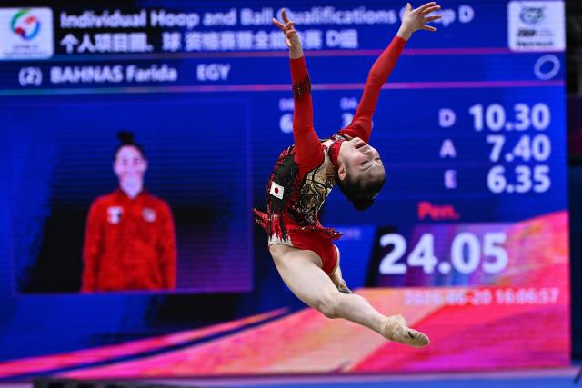Japan's Naruha Suzuki competes in the individual ball of the 2026 Rhythmic Gymnastics World Challenge Cup in Beijing on June 20, 2026. (Photo by Pedro PARDO / AFP)