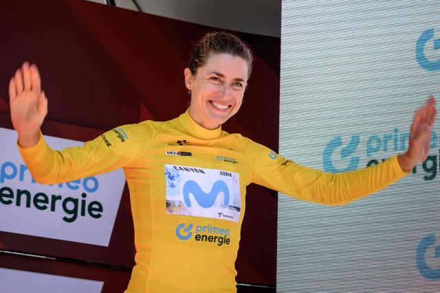 Switzerland's Marlen Reusser wearing the overall leader's yellow jersey celebrates on the podium after winning in the fourth stage, a 23,7 km time trial from Aarburg to Aarburg, at the Women’s Tour of Switzerland (Tour de Suisse) cycling race in Aarburg, Switzerland, on June 20, 2026. (Photo by Fabrice COFFRINI / AFP)
