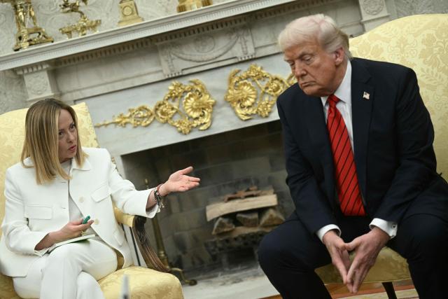(FILES) US President Donald Trump meets with Italian Prime Minister Giorgia Meloni in the Oval Office of the White House in Washington, DC, on April 17, 2025. Trump insists on June 20, 2026 Italian PM Meloni 'asked, over and over' for photo with him at G7. (Photo by Brendan SMIALOWSKI / AFP)