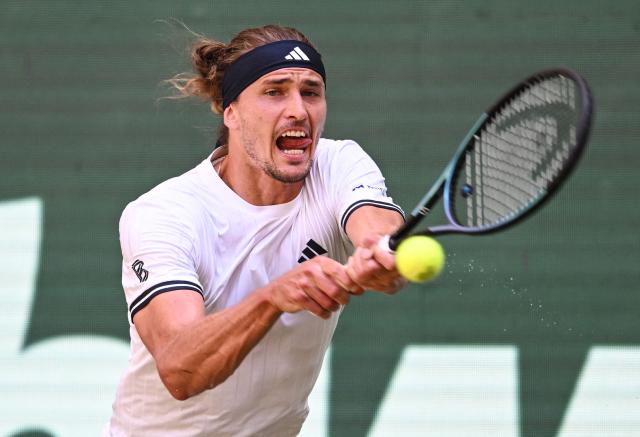 Germany's Alexander Zverev returns the ball to Taylor Fritz of the US during their men's singles semi-final match of the Halle Open ATP tennis tournament in Halle, western Germany, on June 20, 2026. (Photo by CARMEN JASPERSEN / AFP)