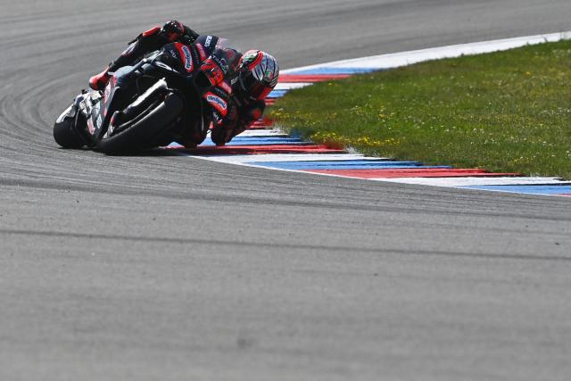 Team Aprilia Racing's Marco Bezzecchi competes during the Sprint race of the MotoGP Grand Prix of Czechia in Brno, Czech Republic, on June 20, 2026. (Photo by Michal Cizek / AFP)