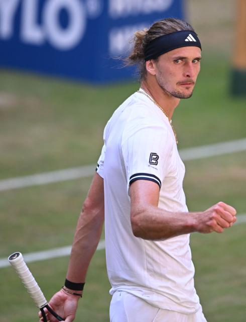 Germany's Alexander Zverev reacts during his men's singles semi-final match against Taylor Fritz of the US of the Halle Open ATP tennis tournament in Halle, western Germany, on June 20, 2026. (Photo by CARMEN JASPERSEN / AFP)