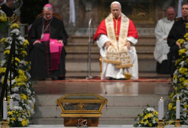 Pope Leo XIV is pictured during the veneration of the Relics of St Augustine at the Augustinian Basilica of St. Peter in the Golden Sky (Basilica di San Pietro in Ciel d’Oro) as part of a pastoral visit in Pavia on June 20, 2026. (Photo by Marco BERTORELLO / AFP)