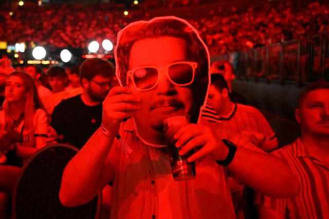 A supporter poses during the semi-final of the IEM Cologne Major 2026 Counter Strike tournament at the Lanxess Arena in Cologne, western Germany ob June 20, 2026. (Photo by Ina FASSBENDER / AFP)