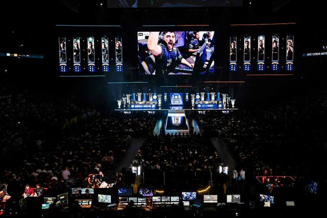 Spectators attends the semi final of the IEM Cologne Major 2026 Counter Strike tournament at the Lanxess Arena in Cologne, western Germany ob June 20, 2026. (Photo by Ina FASSBENDER / AFP)