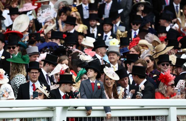 Racegoers attend the fifth day of the Royal Ascot horse racing meeting in Ascot, west of London, on June 20, 2026. (Photo by Henry Nicholls / AFP)