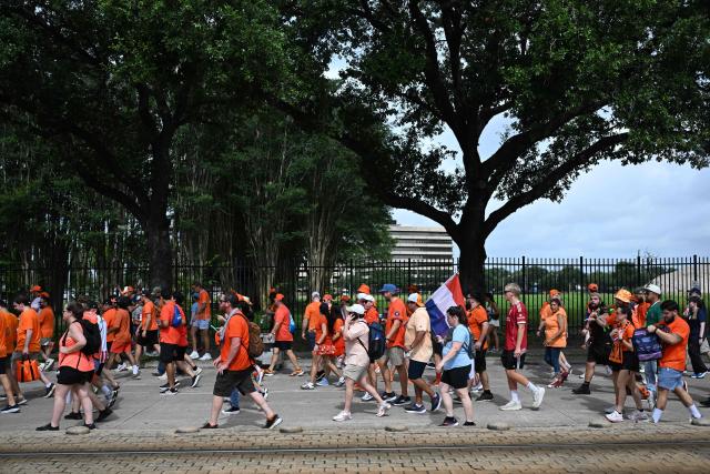Netherlands supporters make their way to the venue to attend a the 2026 World Cup Group F football match between the Netherlands and Sweden at the Houston Stadium in Houston on June 20, 2026.  (Photo by Paul ELLIS / AFP)