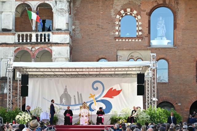 Pope Leo XIV meets with citizens at Piazza Vittoria during a pastoral visit in Pavia on June 20, 2026. (Photo by Marco BERTORELLO / AFP)