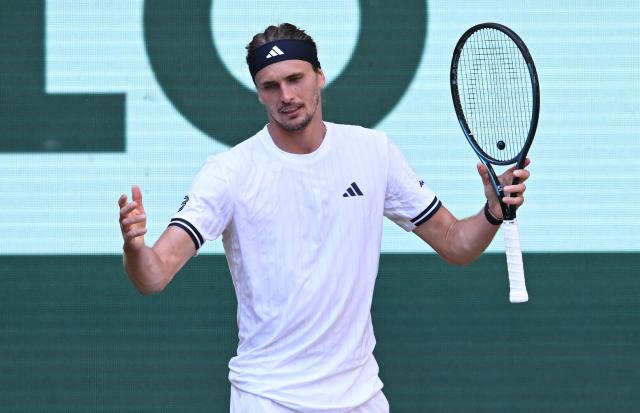 Germany's Alexander Zverev reacts during his men's singles semi-final match against Taylor Fritz of the US of the Halle Open ATP tennis tournament in Halle, western Germany, on June 20, 2026. (Photo by CARMEN JASPERSEN / AFP)
