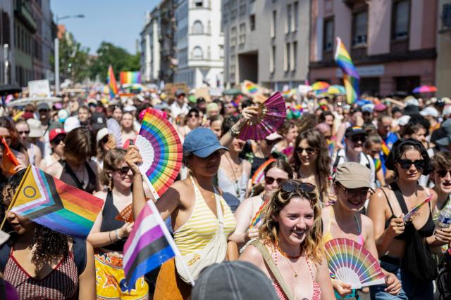 People take part in the annual Gay Pride parade, known in French as « La Marche des Fiertés LGBT+ », in Strasbourg, eastern France on June 20, 2026. (Photo by ROMEO BOETZLE / AFP)