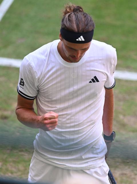 Germany's Alexander Zverev reacts during his men's singles semi-final match against Taylor Fritz of the US of the Halle Open ATP tennis tournament in Halle, western Germany, on June 20, 2026. (Photo by CARMEN JASPERSEN / AFP)