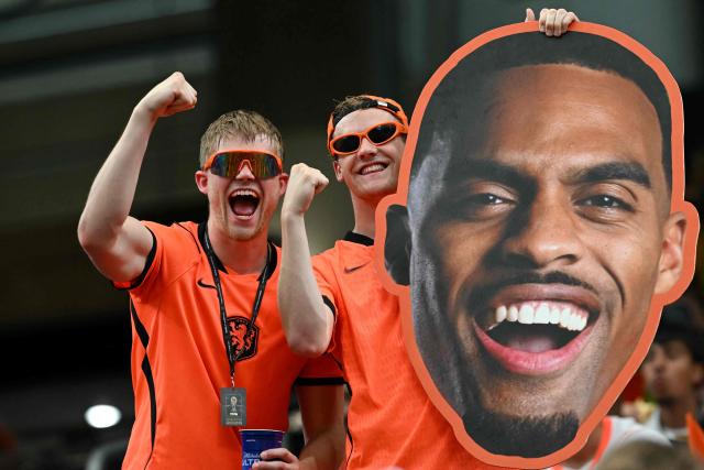 Netherlands' supporters cheer ahead of the 2026 World Cup Group F football match between the Netherlands and Sweden at the Houston Stadium in Houston on June 20, 2026.  (Photo by RONALDO SCHEMIDT / AFP)