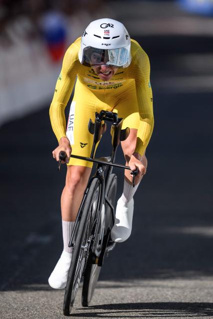UAE Team Emirates-XRG's Slovenian rider Tadej Pogacar competes during the fourth stage, a 23.7 km time trial from Aarburg to Aarburg, at the Men's Tour of Switzerland (Tour de Suisse) cycling race in Aarburg, Switzerland, on June 20, 2026. (Photo by Fabrice COFFRINI / AFP)