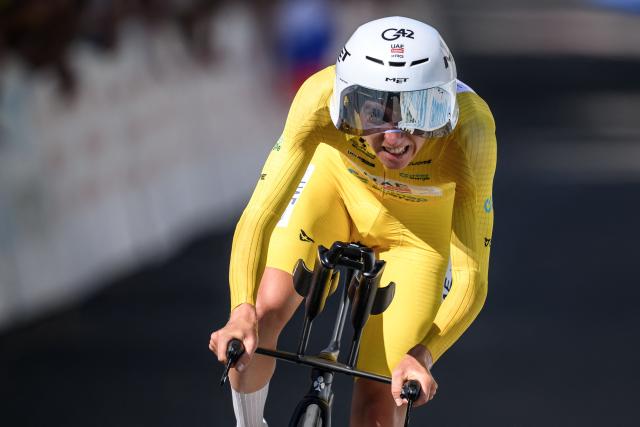 UAE Team Emirates-XRG's Slovenian rider Tadej Pogacar competes during the fourth stage, a 23.7 km time trial from Aarburg to Aarburg, at the Men's Tour of Switzerland (Tour de Suisse) cycling race in Aarburg, Switzerland, on June 20, 2026. (Photo by Fabrice COFFRINI / AFP)