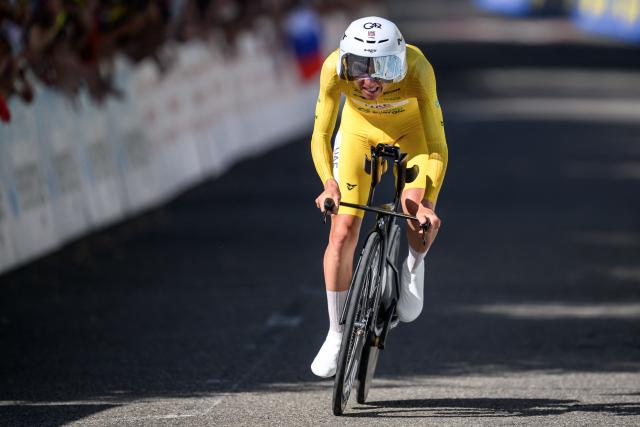 UAE Team Emirates-XRG's Slovenian rider Tadej Pogacar competes during the fourth stage, a 23.7 km time trial from Aarburg to Aarburg, at the Men's Tour of Switzerland (Tour de Suisse) cycling race in Aarburg, Switzerland, on June 20, 2026. (Photo by Fabrice COFFRINI / AFP)