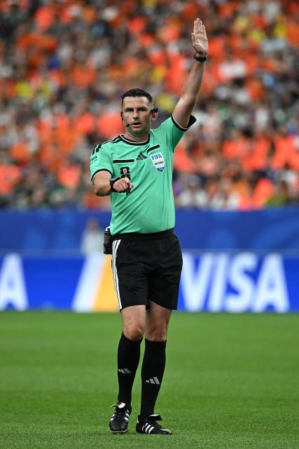 English referee Michael Oliver gestures a ruling during the 2026 World Cup Group F football match between the Netherlands and Sweden at the Houston Stadium in Houston on June 20, 2026.  (Photo by Paul ELLIS / AFP)