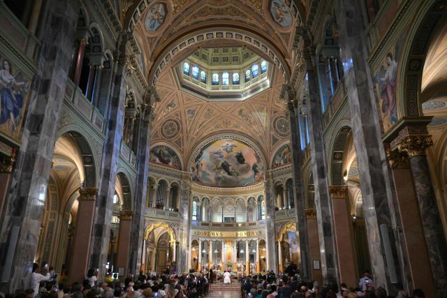 Pope Leo XIV listens to Maurizio Malvestiti, bishop of Lodi, at the Parish of Saints Anthony Abbot and Francesca Cabrini in Sant'Angelo Lodigiano during a pastoral visit in Pavia and Sant'Angelo Lodigiano, on June 20, 2026. (Photo by Marco BERTORELLO / AFP)