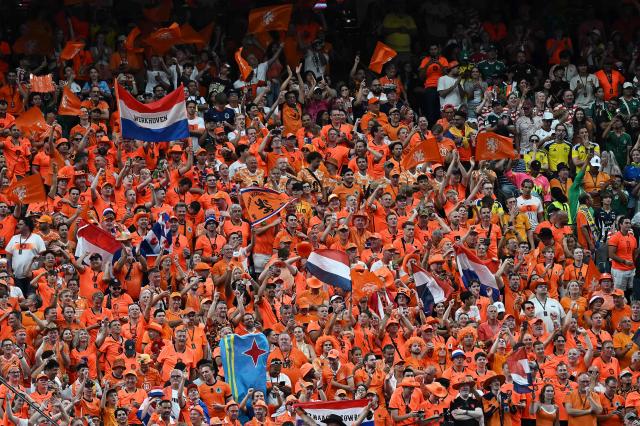 Netherlands supporters cheer their team during the 2026 World Cup Group F football match between the Netherlands and Sweden at the Houston Stadium in Houston on June 20, 2026.  (Photo by Paul ELLIS / AFP)