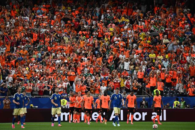 Netherlands' players celebrate their third goal during the 2026 World Cup Group F football match between the Netherlands and Sweden at the Houston Stadium in Houston on June 20, 2026.  (Photo by Paul ELLIS / AFP)