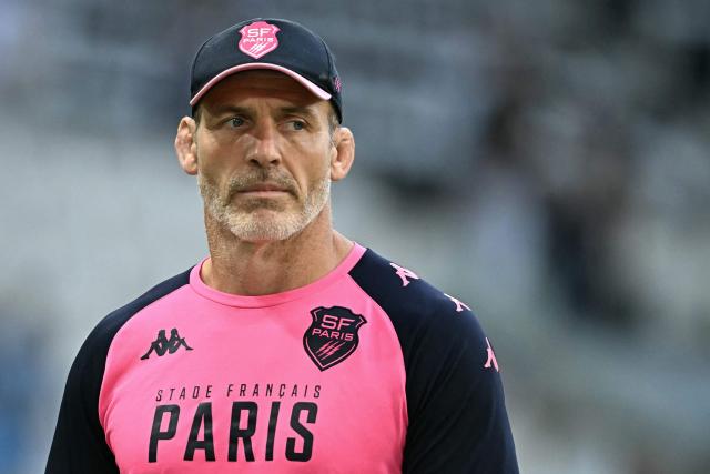 Stade Français' English head coach Paul Gustard walks on the pitch ahead of the French Top14 rugby union semi-final match between Montpellier Hérault Rugby and Stade Français at the Velodrome stadium in Marseille, southern France, on June 20, 2026. (Photo by Gabriel BOUYS / AFP)