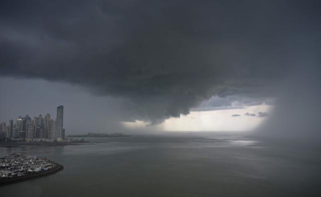 Storm clouds are seen over Panama City on June 20, 2026. (Photo by MARTIN BERNETTI / AFP)