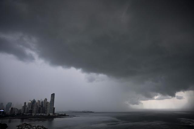 Storm clouds are seen over Panama City on June 20, 2026. (Photo by MARTIN BERNETTI / AFP)