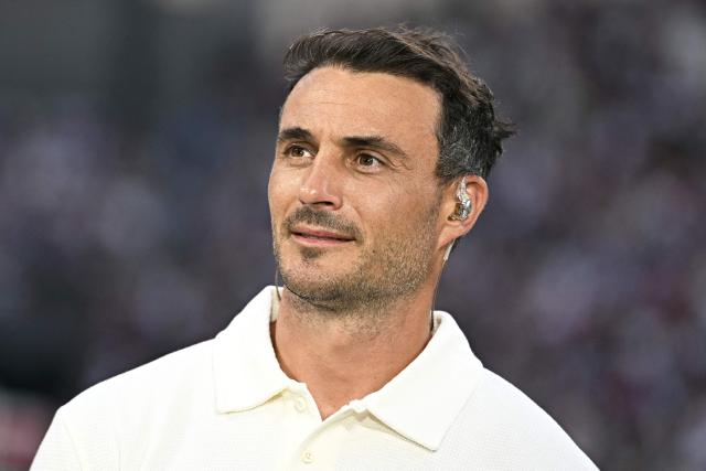 Former French rugby union player and TV commentator Nans Ducuing reacts ahead of the French Top14 rugby union semi-final match between Montpellier Hérault Rugby and Stade Français at the Velodrome stadium in Marseille, southern France, on June 20, 2026. (Photo by Gabriel BOUYS / AFP)