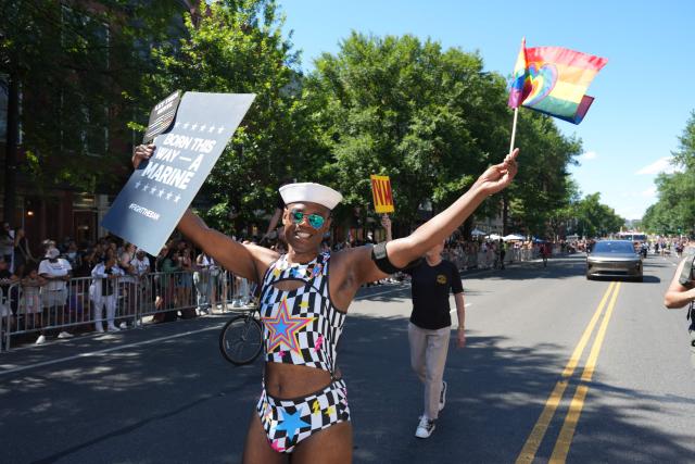 A parade-goer participates in the annual Capital Pride Parade in Washington, DC, on June 20, 2026.  (Photo by Ken Cedeno / AFP)